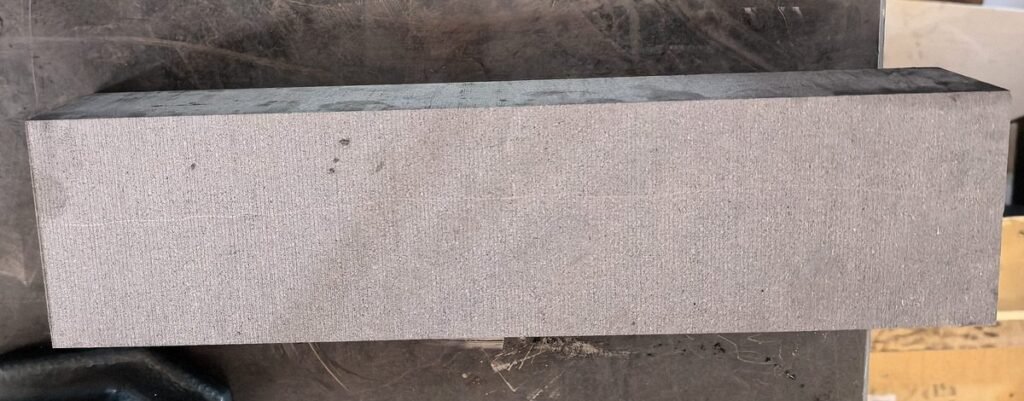 Graphite Cutting Solution Diamond wire cut surface of a grade 2554 isostatic graphite bar